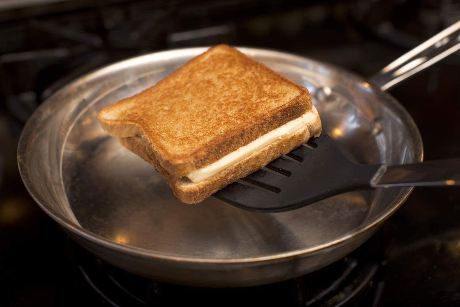 SIGNAMIO® Black Nylon Slotted Turner Spatula for Non Stick Pan - Steel Handle, Ideal for Dosa, Omelet, and Roti Cooking, 30.x 5.CM